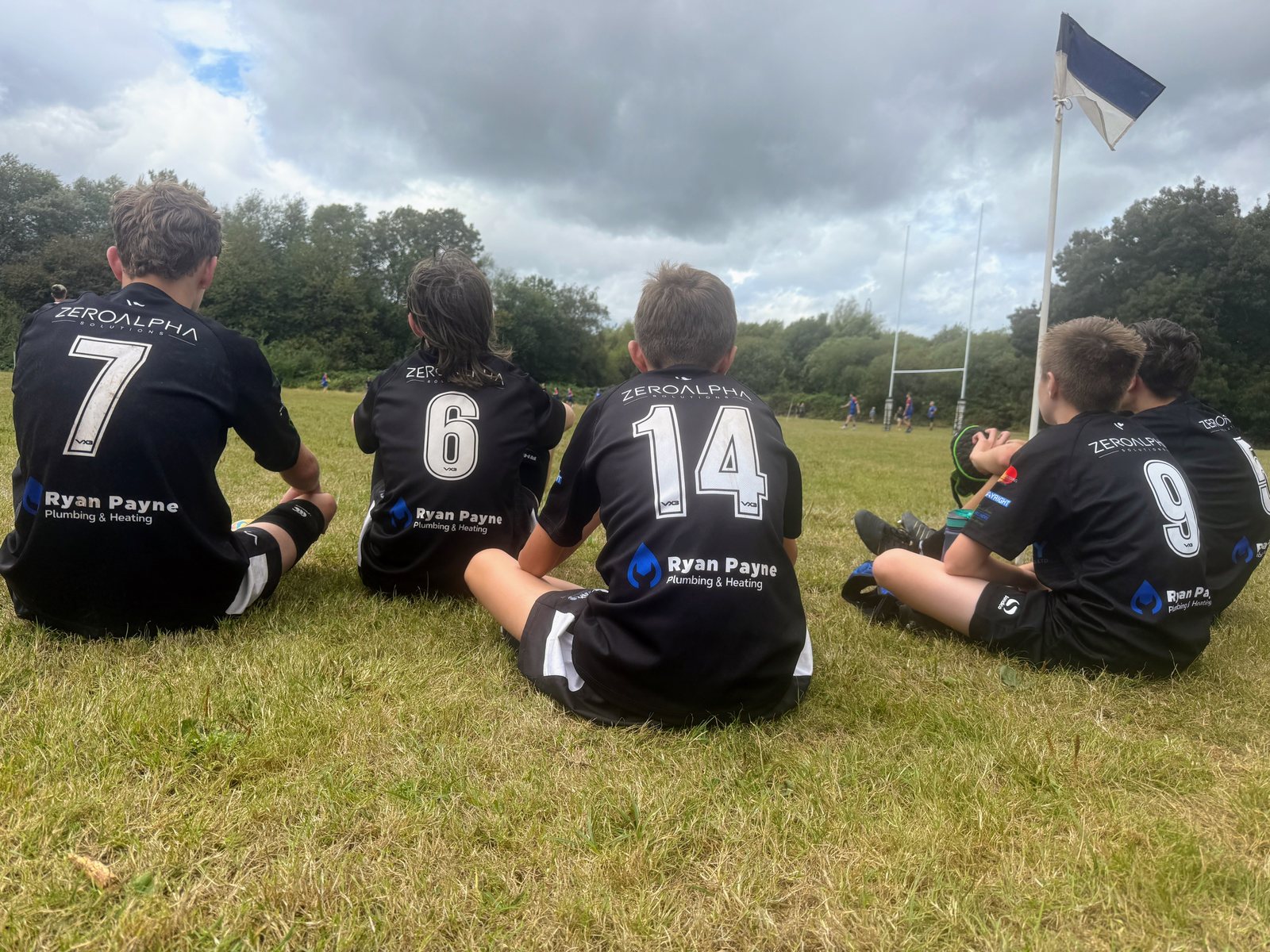 Squad watching from the sideline